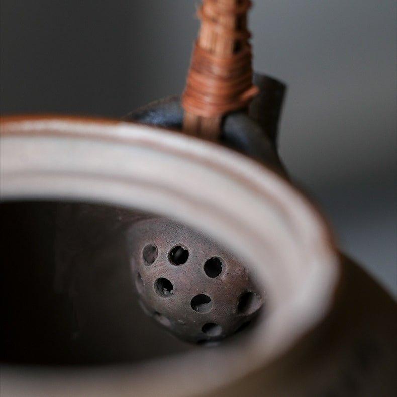 Handcrafted Ceramic Ball-Shaped Boiler with Rattan Handle