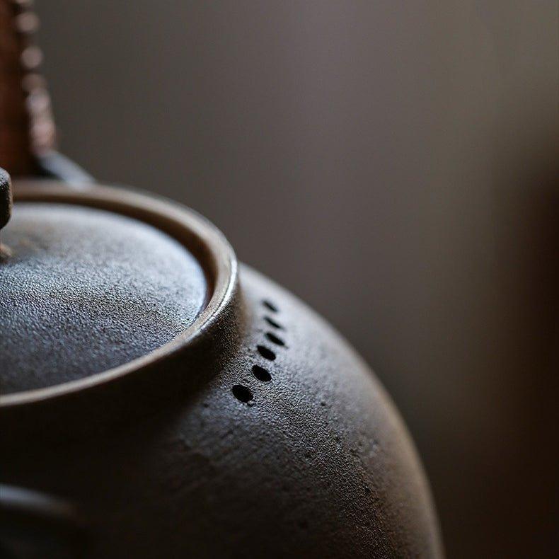 Handcrafted Ceramic Ball-Shaped Boiler with Rattan Handle