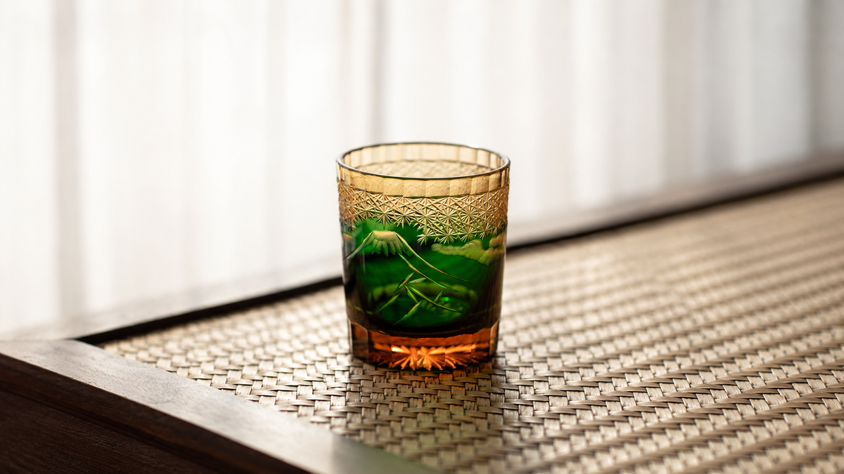 Green Mount Fuji whisky tumbler with mountain scenery and geometric cut decoration