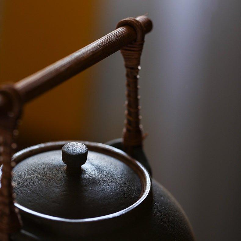 Handcrafted Ceramic Ball-Shaped Boiler with Rattan Handle