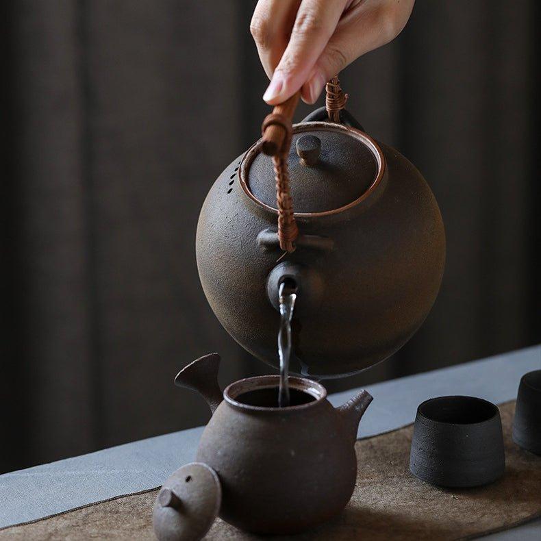 Handcrafted Ceramic Ball-Shaped Boiler with Rattan Handle