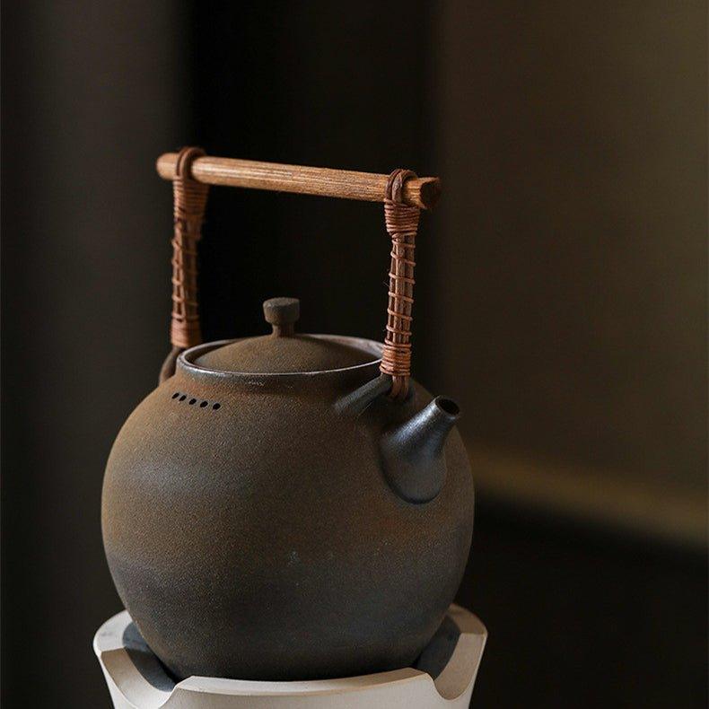 Handcrafted Ceramic Ball-Shaped Boiler with Rattan Handle
